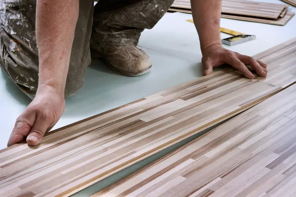 depositphotos_5340326-stock-photo-home-improvement-floor-installation